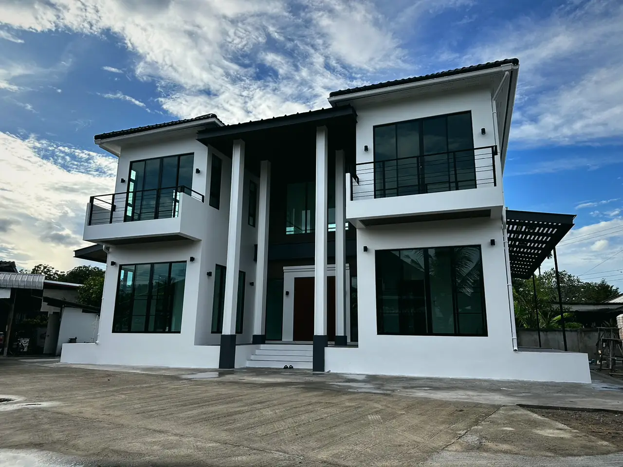 Two-storey modern with tall columns
