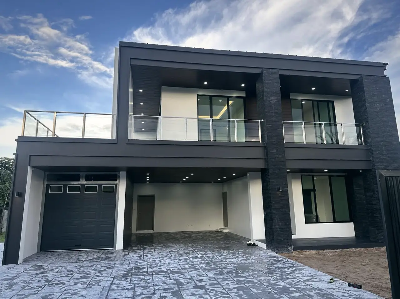 Dark modern with covered parking